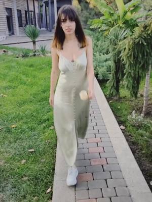 Video by Alina Kurson: https://www.pexels.com/video/woman-walking-in-dress-with-...